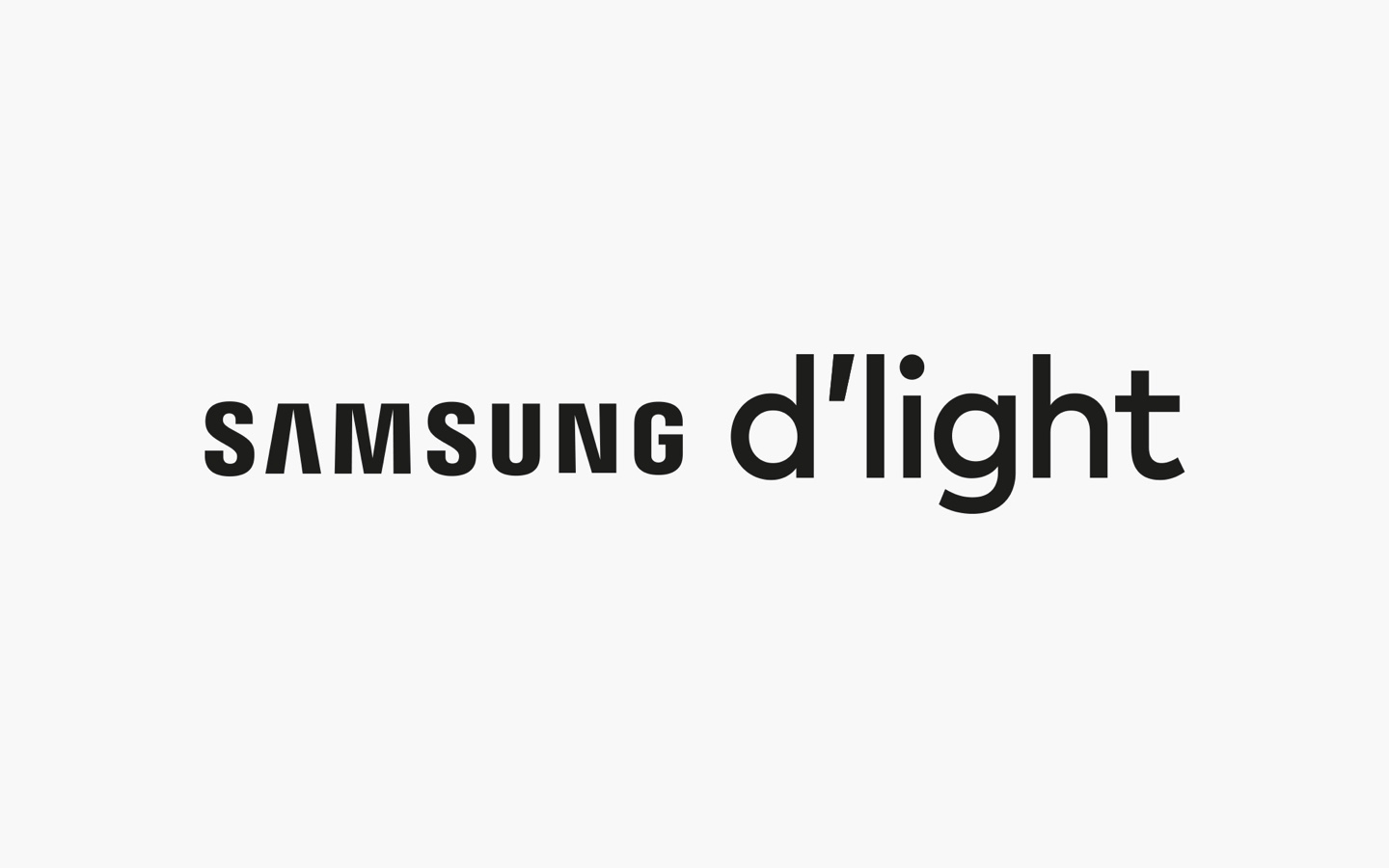 blurry photo of sunset over ocean with logo on top